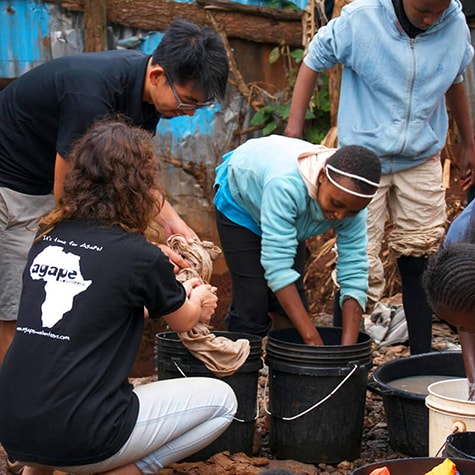 Volunteers Helping to Wash Clothes in Kenya