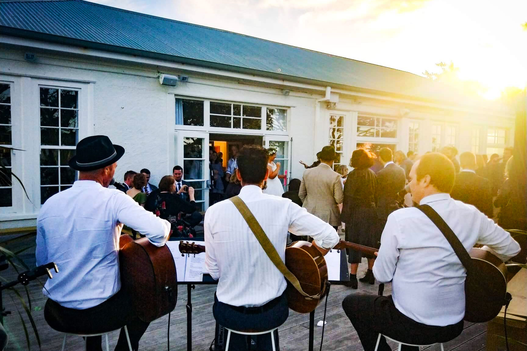 The Kens acoustic trio performing at a private function
